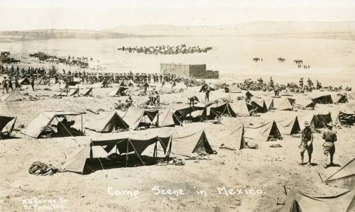 Black and white image of troops and tents in Mexico during the Battle of Columbus.