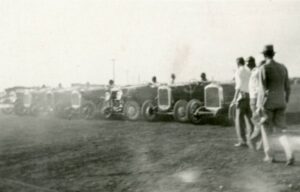 Albuquerque Museum photograph, ca. 1930 of race cars on east mesa.